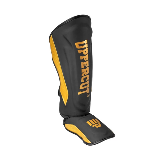 CANILLERAS PARA  ARTES MARCIALES GOLD/BLACK M